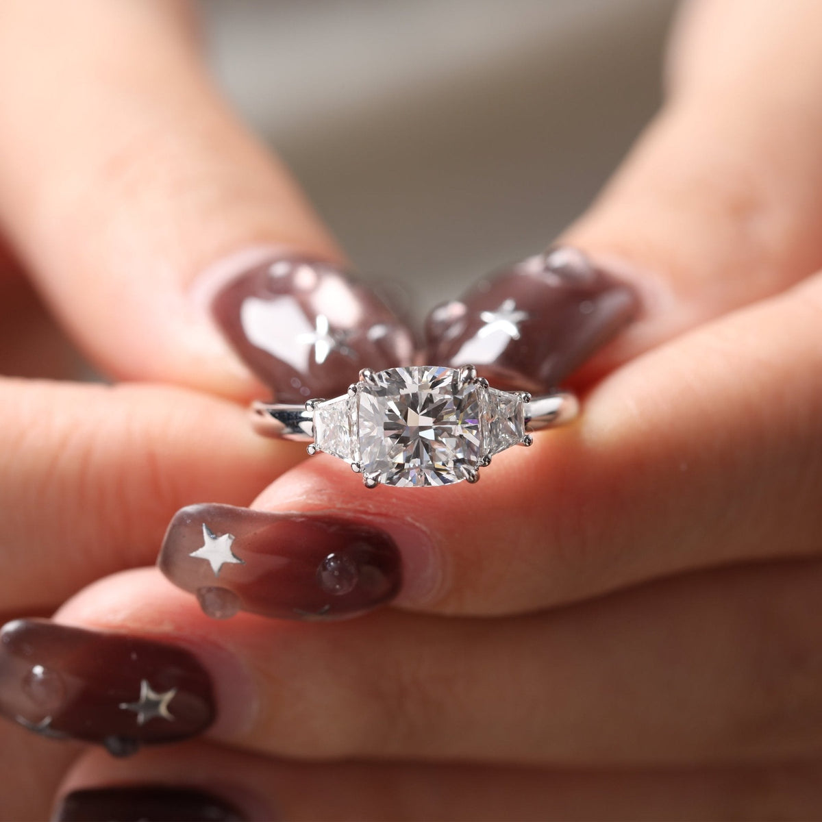 Cushion Brilliant - Cut Lab Diamond Three - Stone Engagement Ring with 4 - Claw Prong Basket Setting and Brilliant - Cut Trapezoid Side Stones - FIORESE JEWELRY