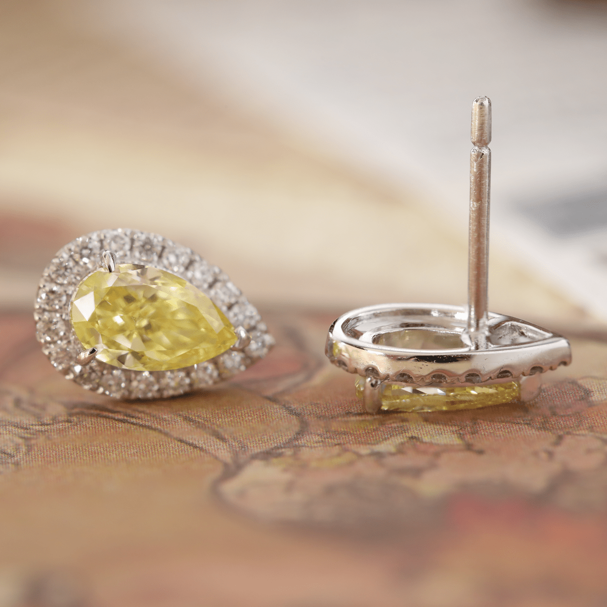 Platinum 1.5 ct tw Pear Shaped Fancy Yellow Lab Diamond Stud Earrings with Round Lab Diamond Halo - FIORESE JEWELRY