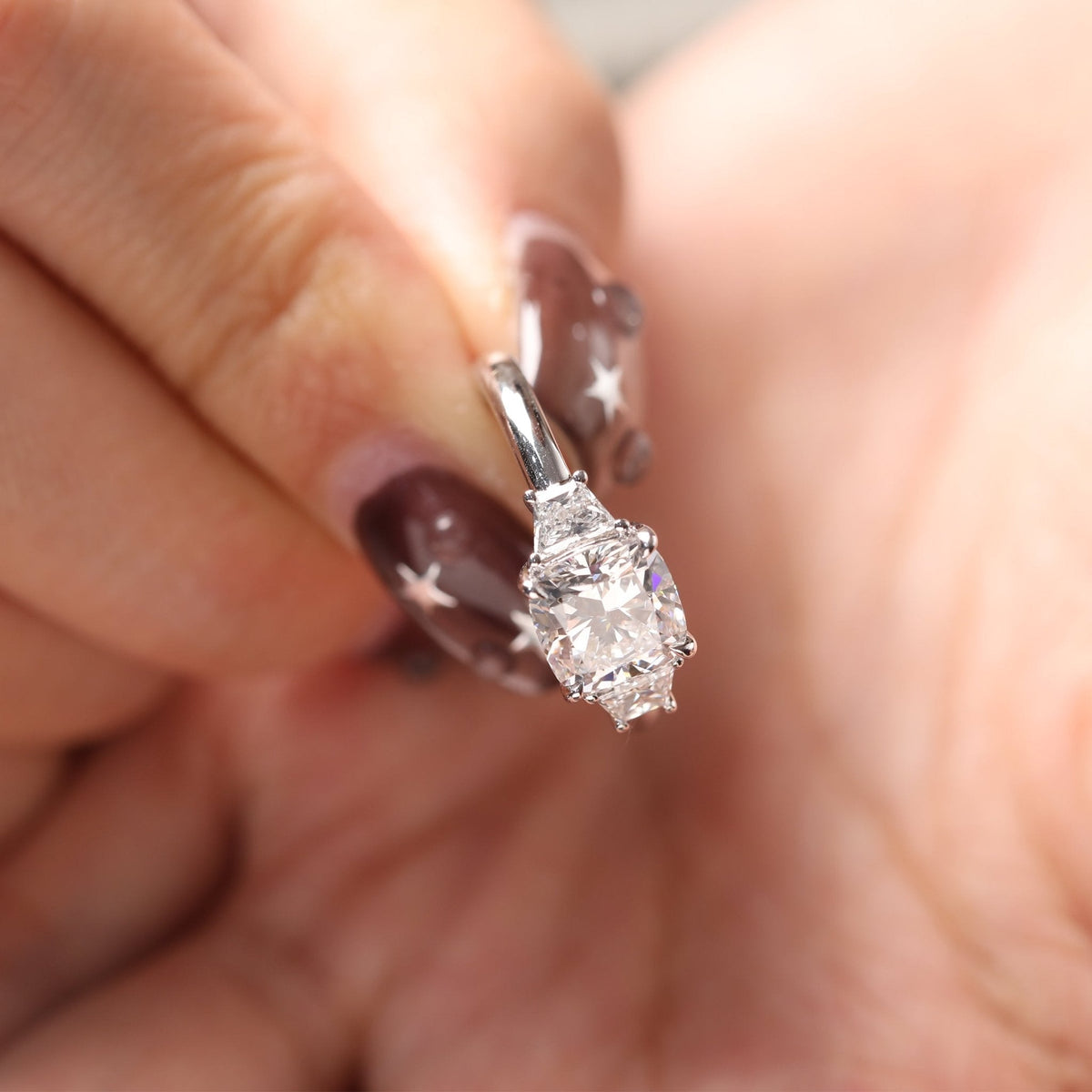 Cushion Brilliant - Cut Lab Diamond Three - Stone Engagement Ring with 4 - Claw Prong Basket Setting and Brilliant - Cut Trapezoid Side Stones - FIORESE JEWELRY