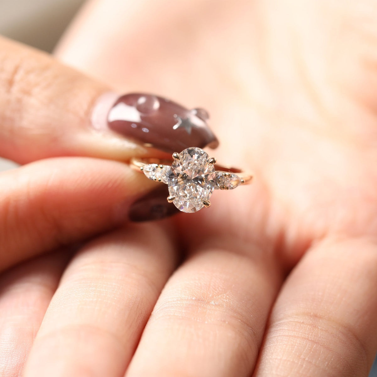 Oval Lab Diamond Ring with Four - Claw Prong Basket Setting and Round and Pear Lab Diamond Side Stones - FIORESE JEWELRY